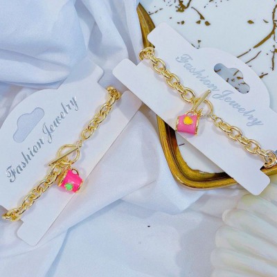 pulsera eslabon con dije oro chino 12.5&