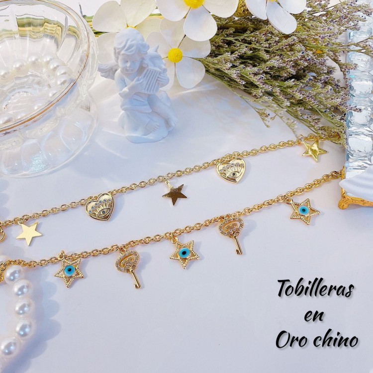 tobillera lujos con dijes 10&