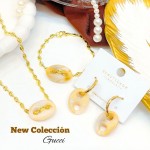 juegos Gucci (incluye cadena pulsera y zarcillo )